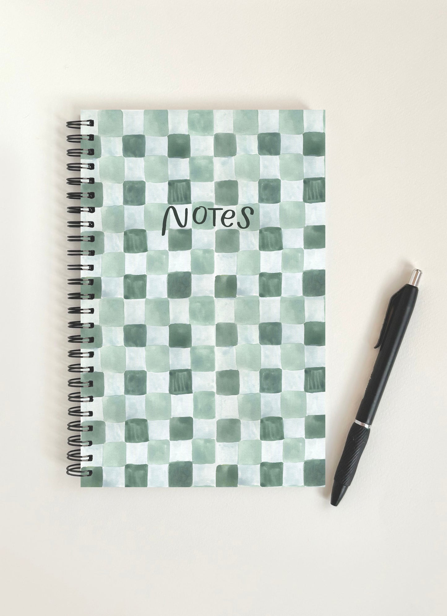 Green check notebook