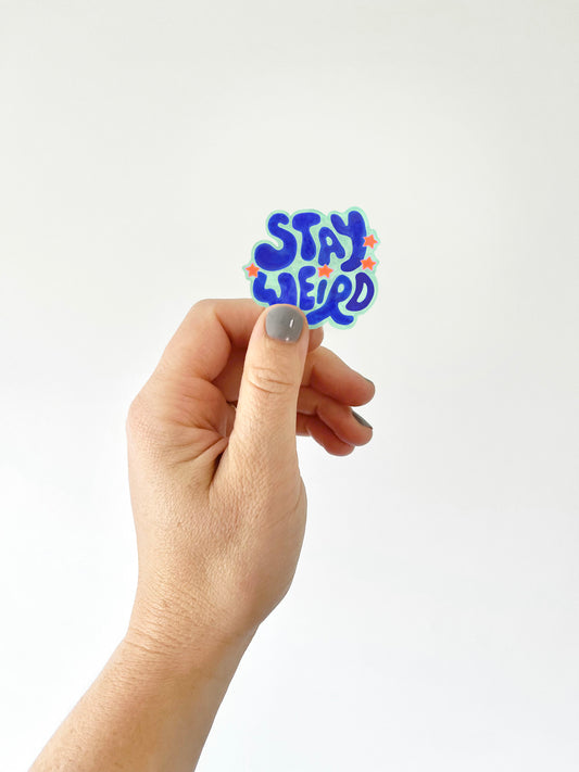 Stay weird sticker