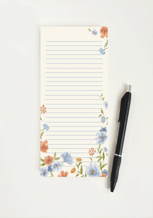 Tall blue and orange floral notepad